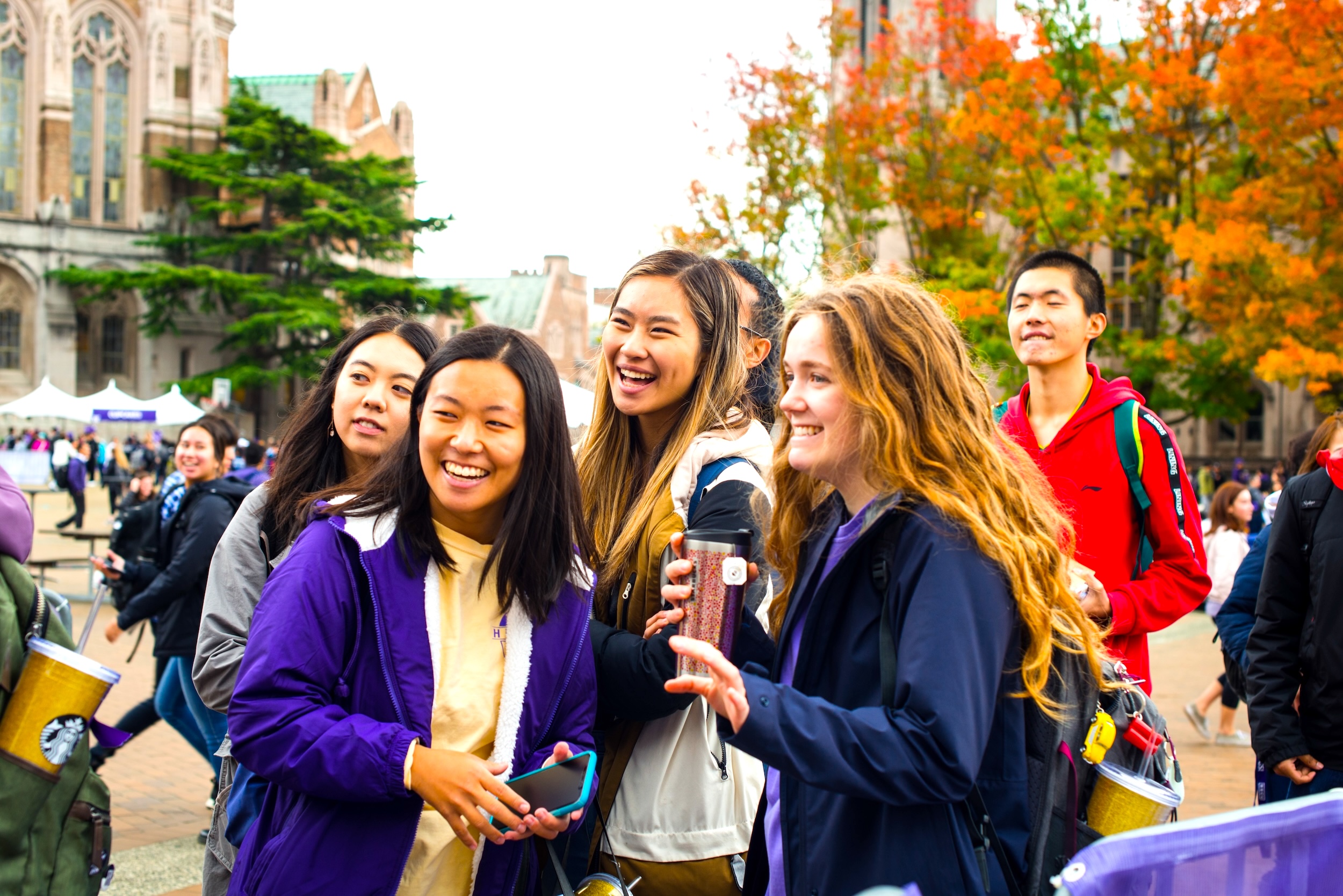 students together in red square