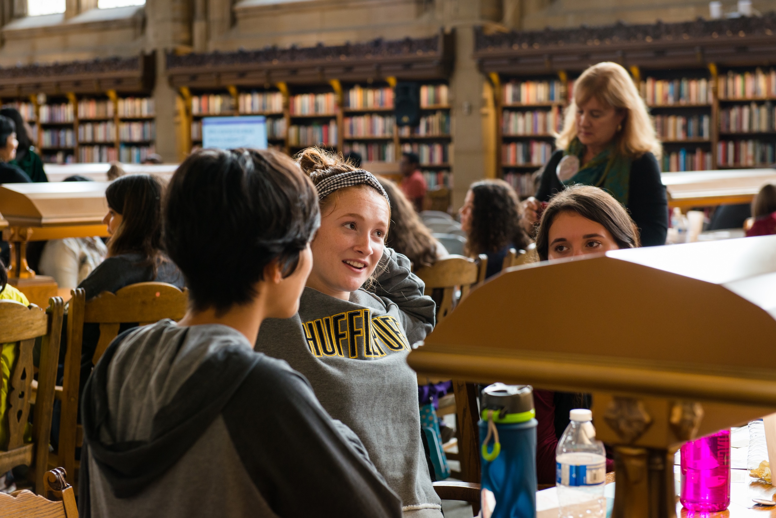 students working together in the Suzzallo reading room. 
