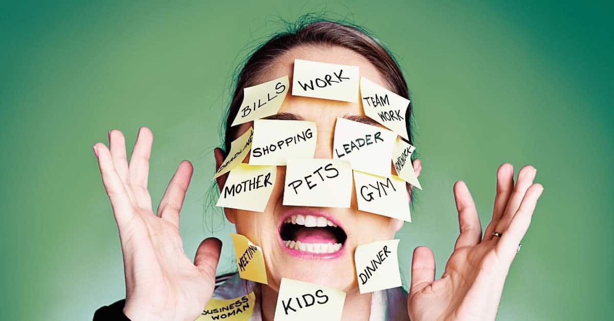 Person with sticky notes stuck to their face with tasks